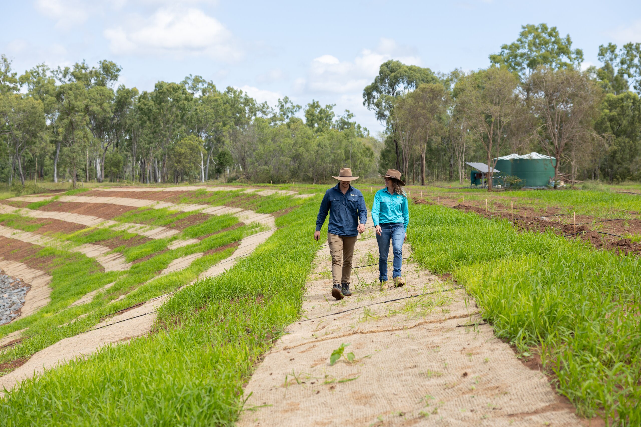 Braden Mitchell and Jodee Forbes walking along Stoney Creek Stanwell